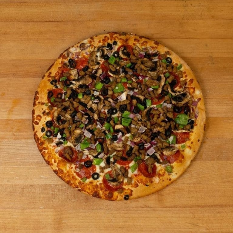 Indulge in Our Supreme Pizza